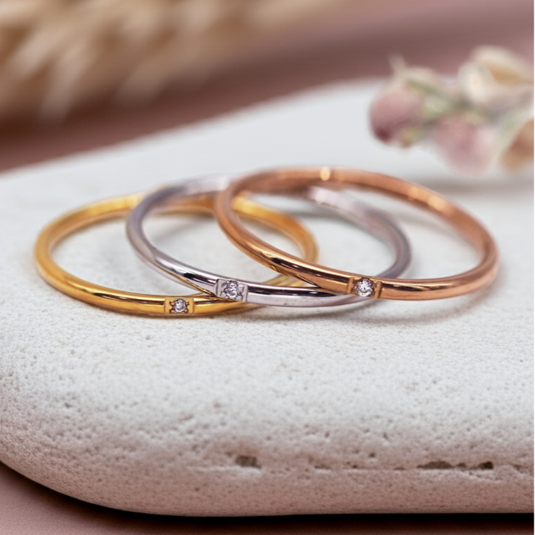 silver, gold and rose gold stacker rings by indie and harper australia