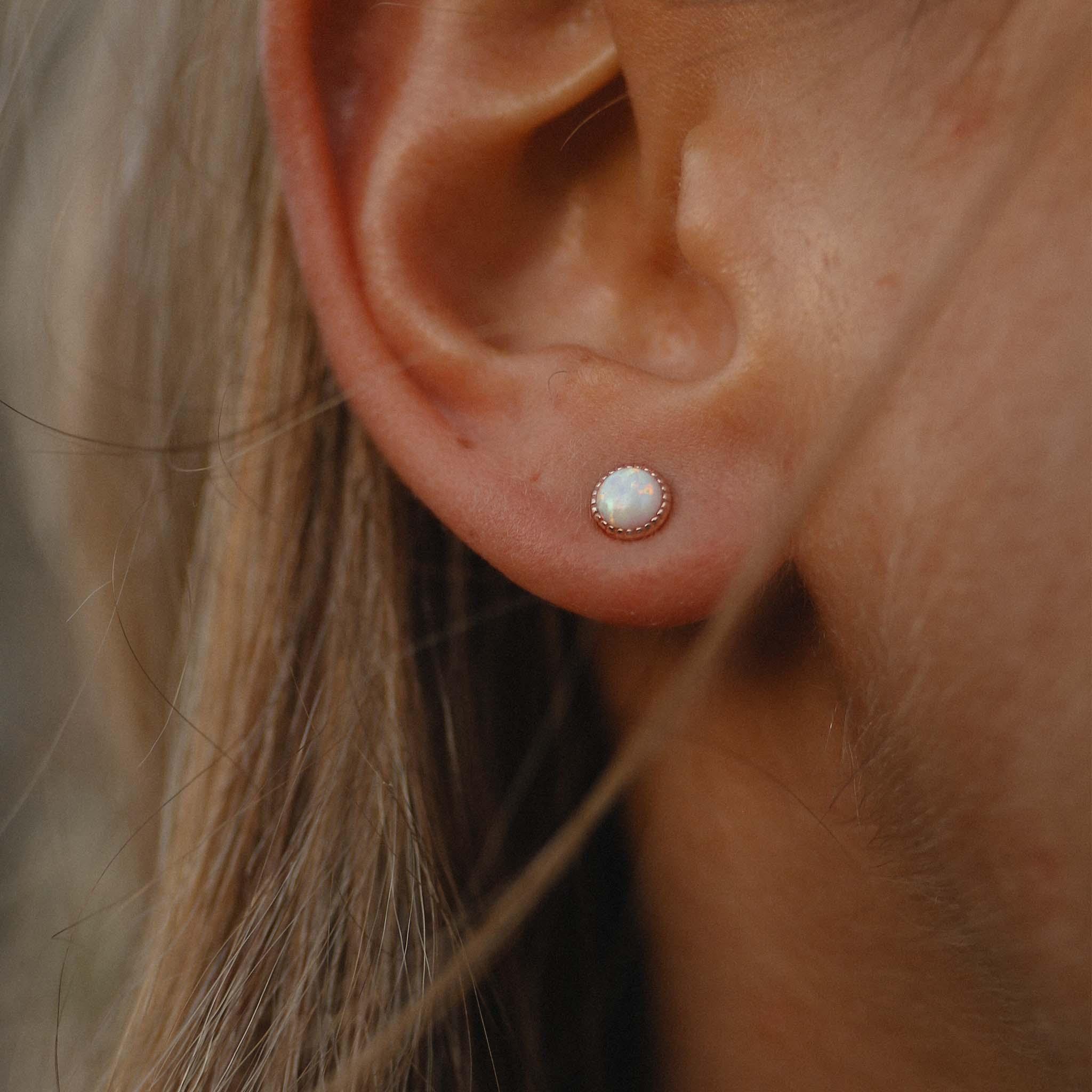 woman wearing dainty rose gold opal earrings - womens white opal jewellery australia - australian jewellery online