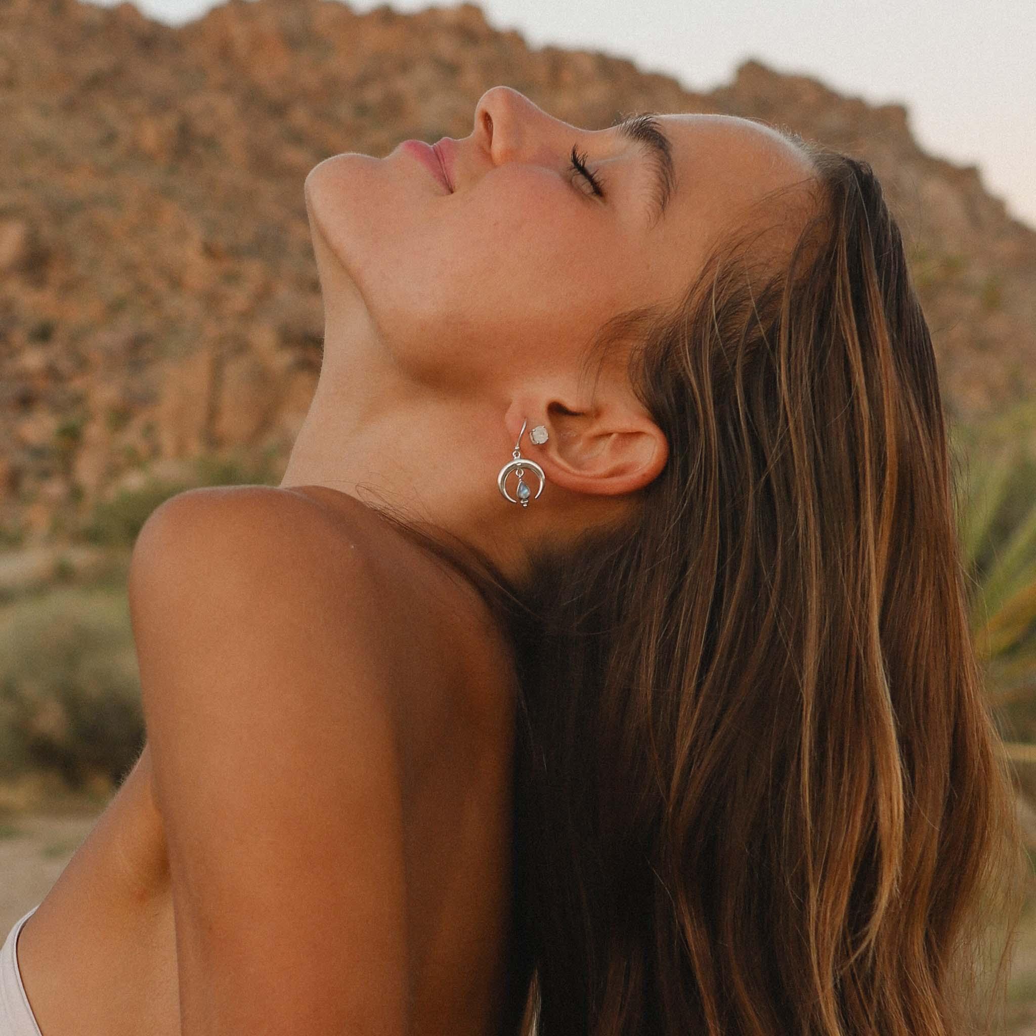 indie and harper sterling silver moonstone earrings being worn