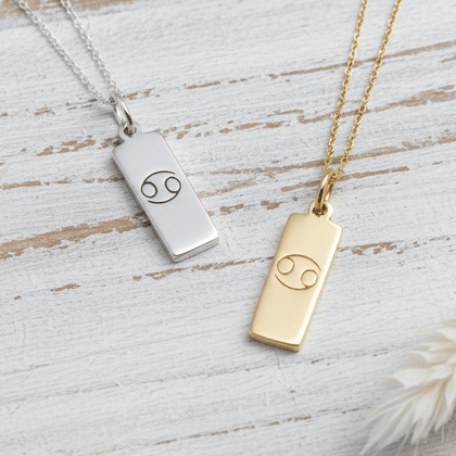 Zodiac necklaces in silver and gold with the cancer star sign 