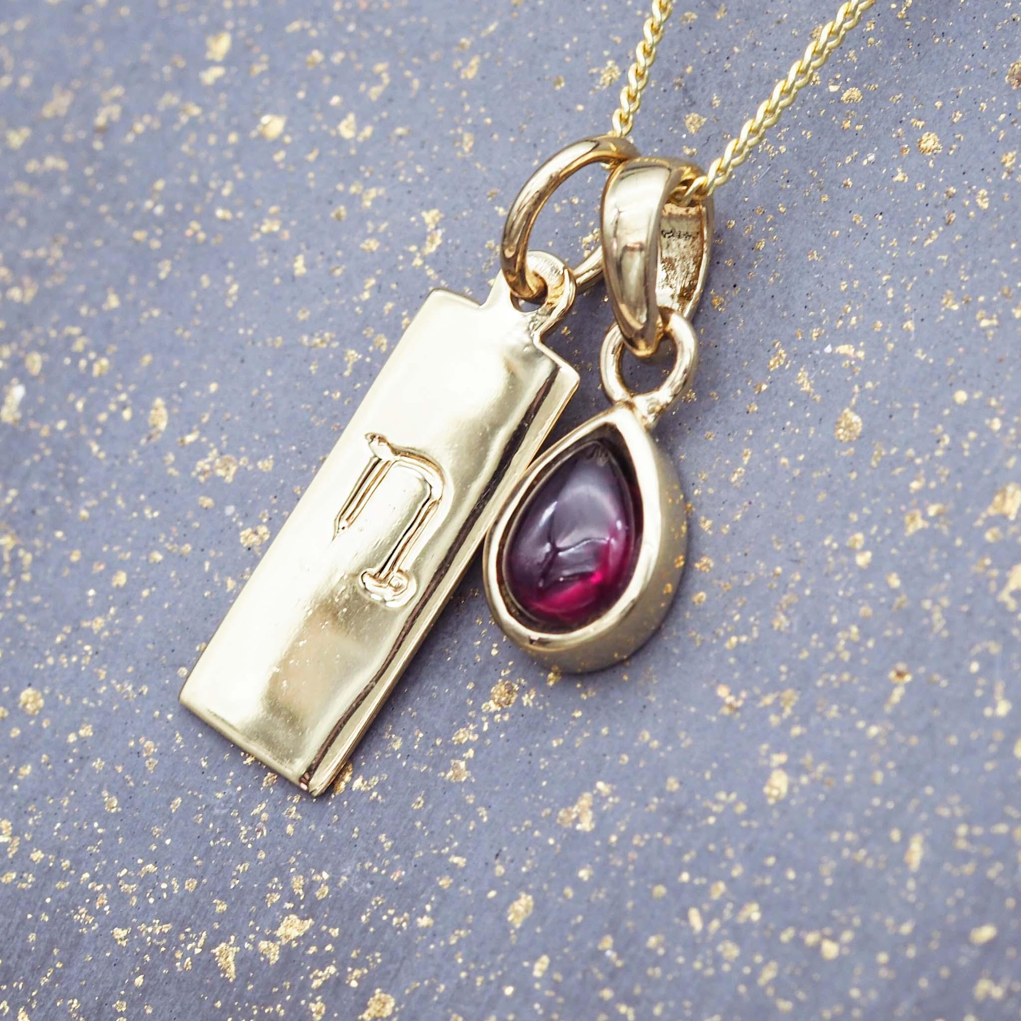 gold Zodiac Capricorn pendant and January Birthstone garnet Necklace by indie and harper australia