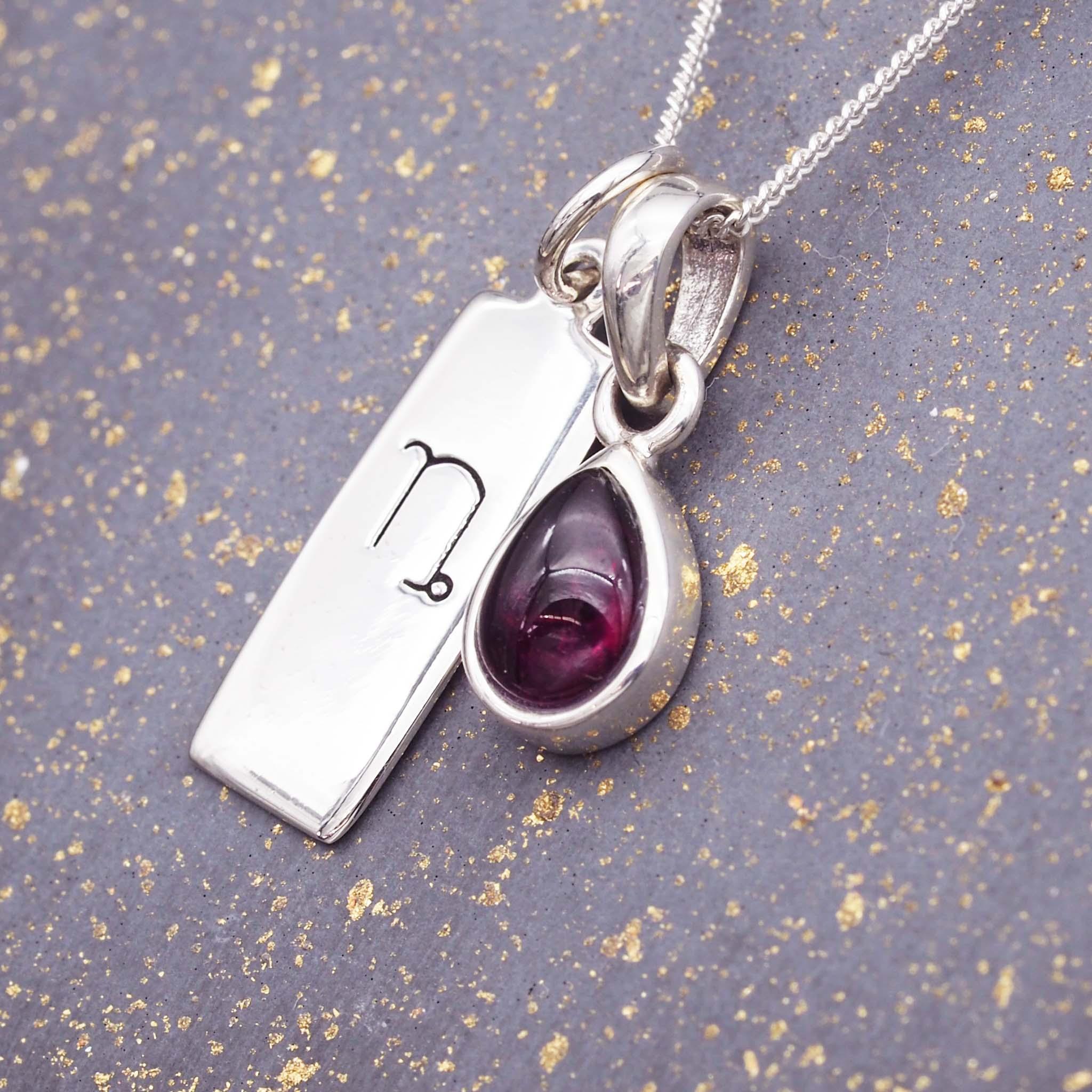 sterling silver Zodiac Capricorn pendant and January Birthstone garnet Necklace by indie and harper australia