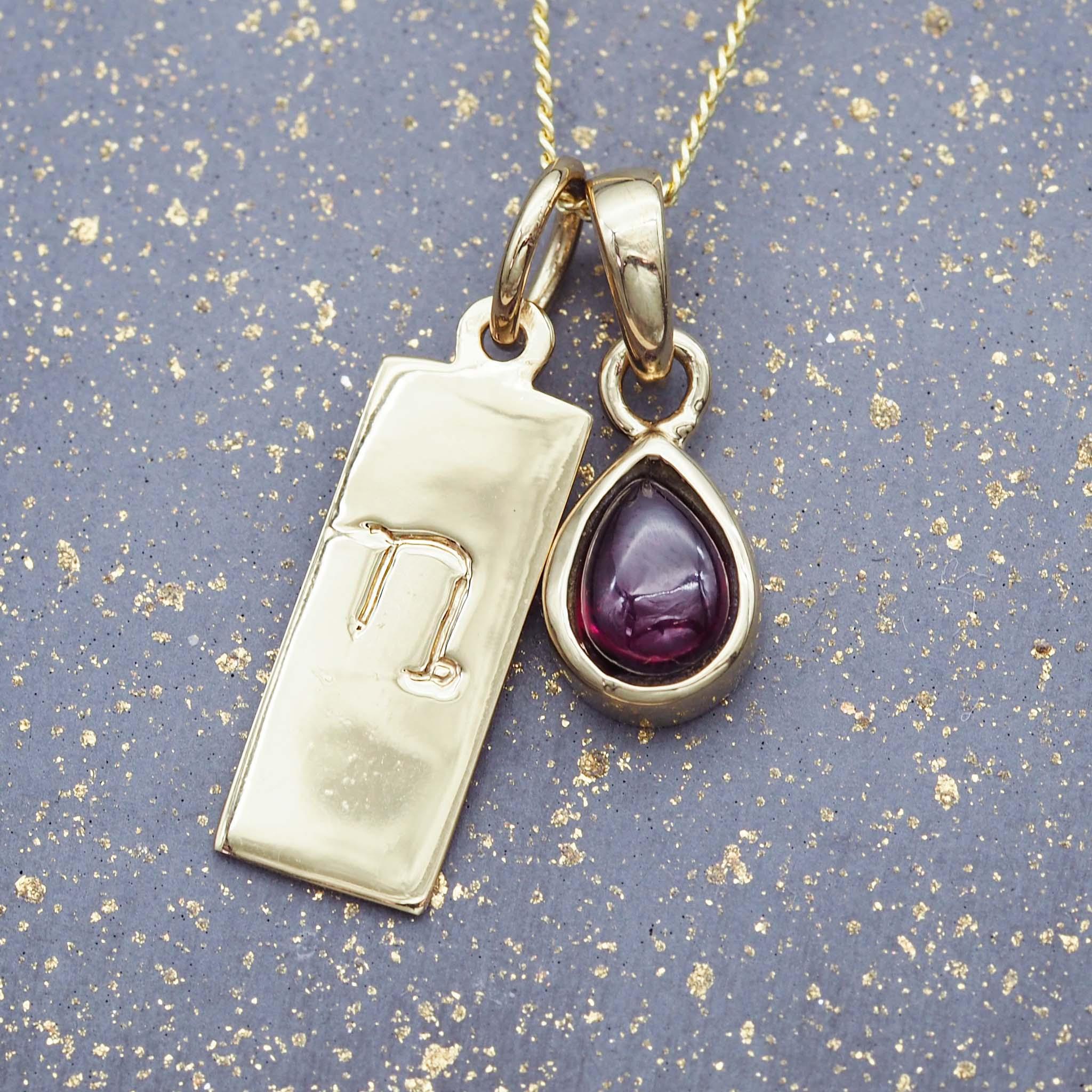 gold Zodiac Capricorn pendant and January Birthstone garnet Necklace by indie and harper australia