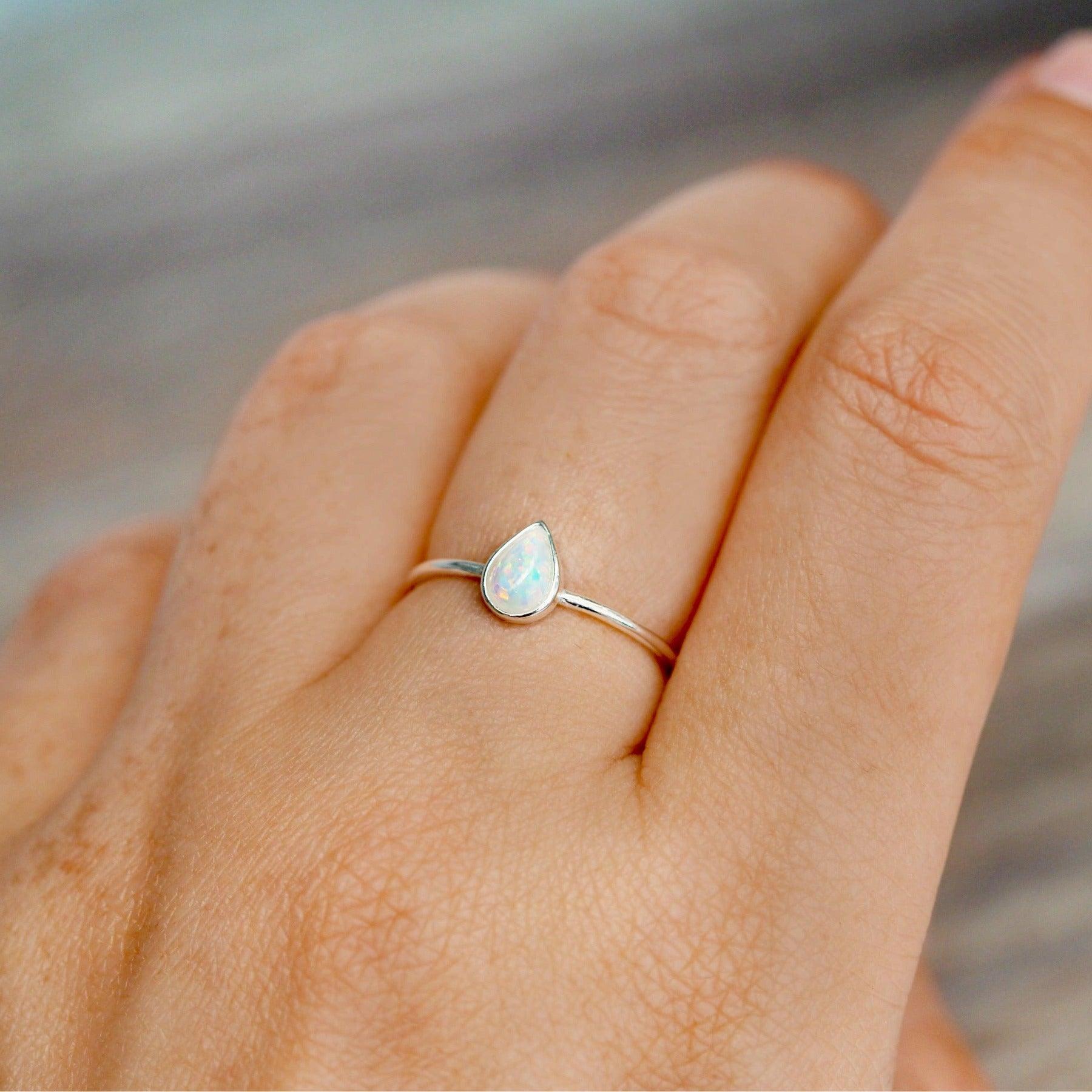 sterling silver dainty white Opal Ring being worn - white opal jewellery by australian jewellery brands indie and Harper