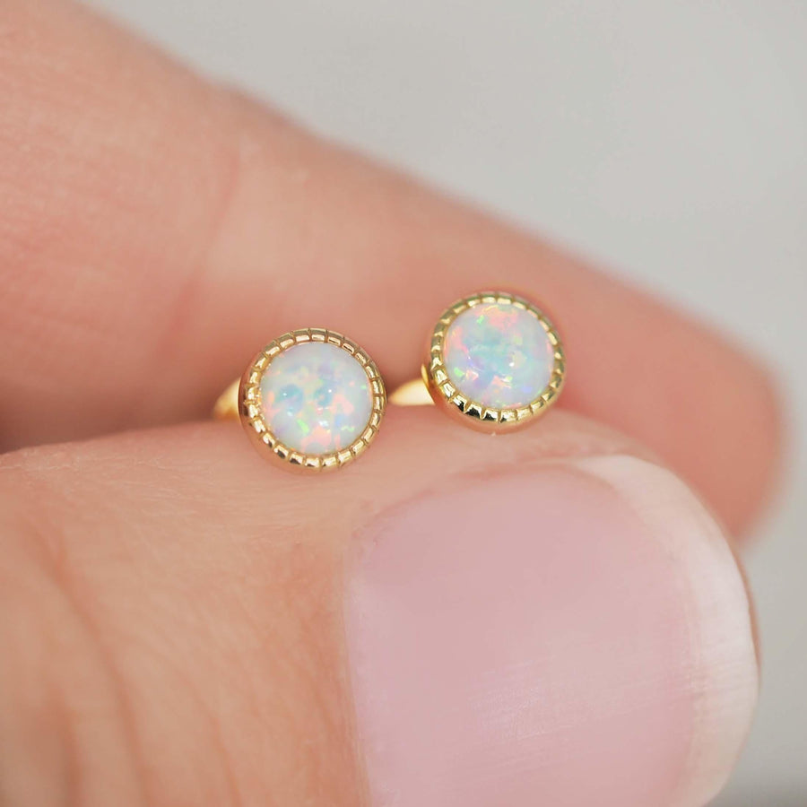 dainty gold earrings with opals