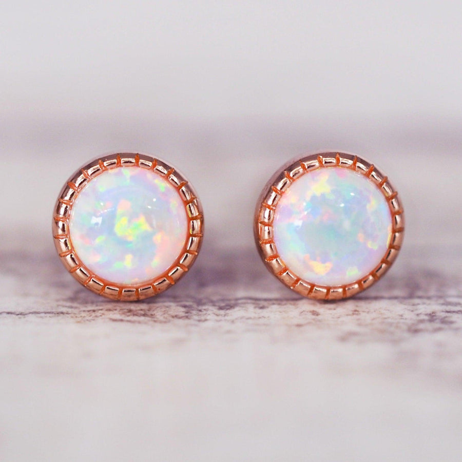 dainty rose gold earrings with opals shining with rainbow colours- womens jewellery by indie and harper