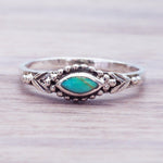 Dainty marquise reconstructed turquoise ring in 925 sterling silver with bezel setting and slim stackable band