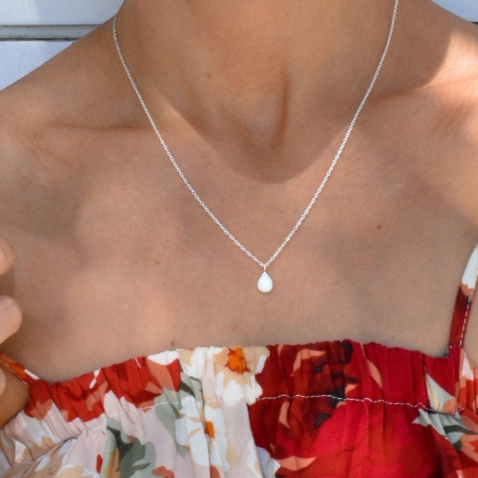 Woman wearing Dainty Opal Necklace - white opal jewellery by indie and harper Australia 