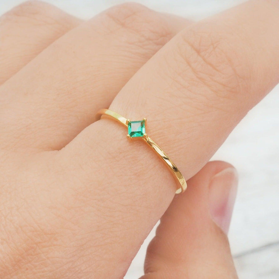 Dainty gold Emerald Ring being worn - womens gold emerald jewellery by indie and harper