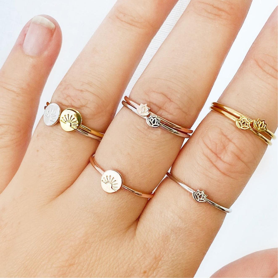 Hand wearing multiple Dainty Rings in gold, silver and rose gold - womens jewellery Australia by indie and harper