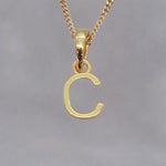 gold initial c pendant necklace by indie and harper