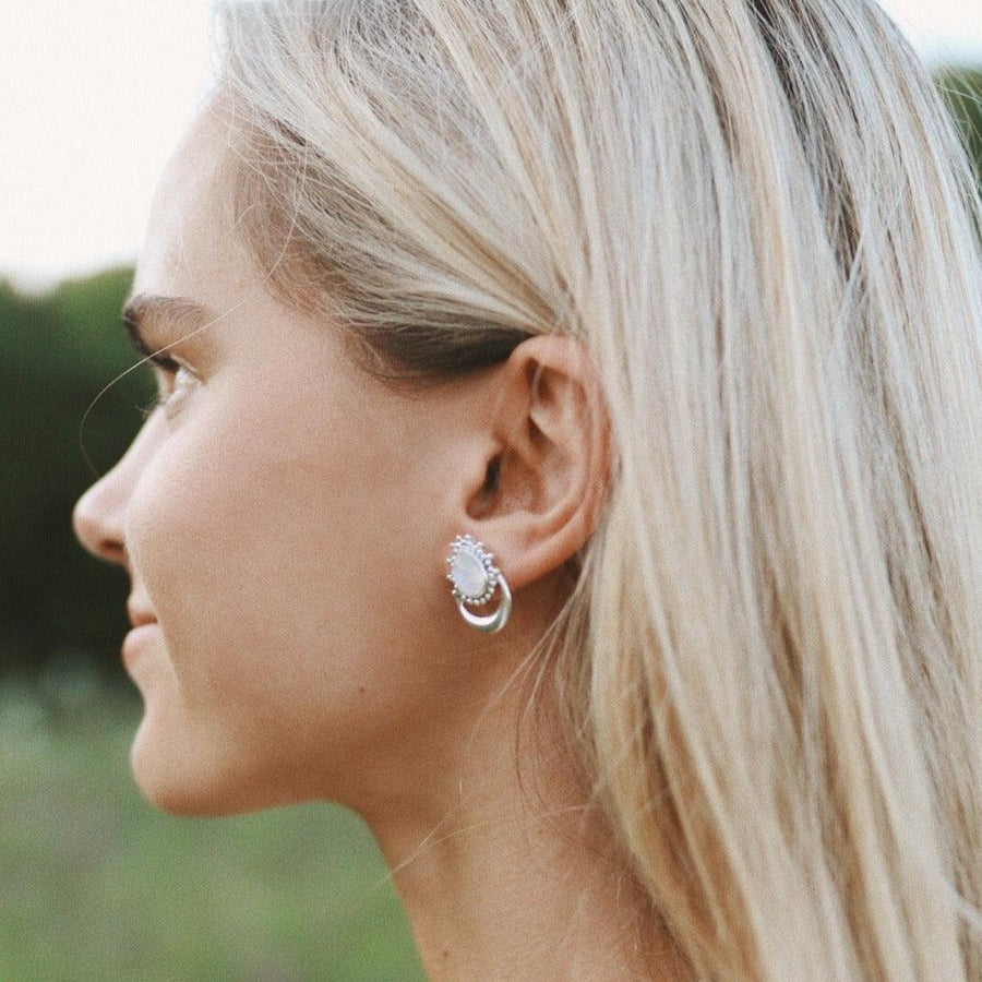 Woman wearing Sterling silver Half Moon Moonstone Earrings - womens moonstone jewellery Australia 