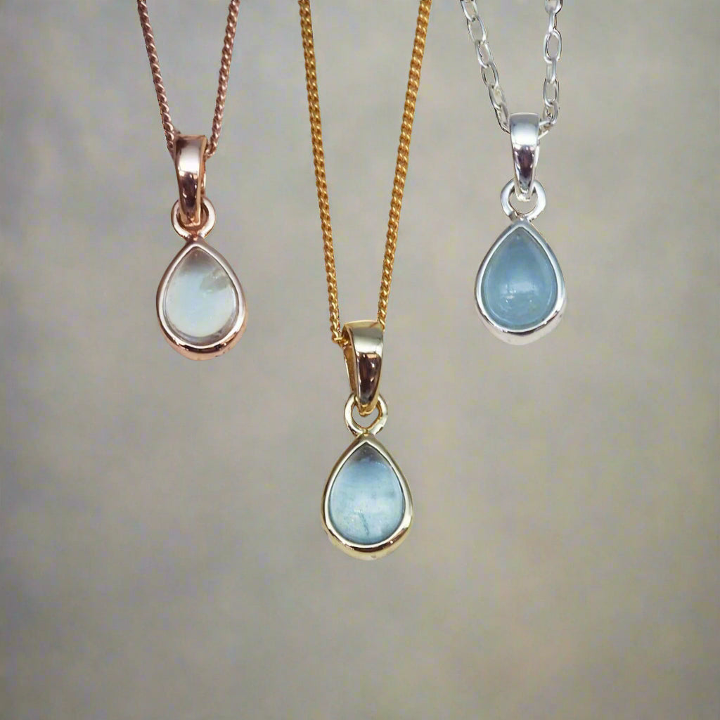 March birthstone aquamarine necklaces in rose gold, gold and silver by indie and Harper australia
