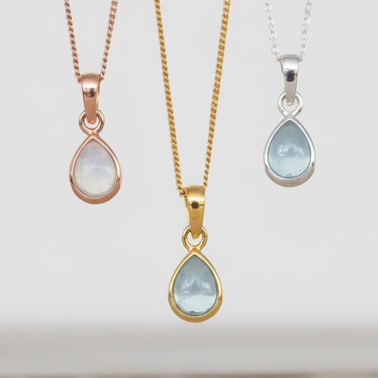 March birthstone aquamarine necklaces in rose gold, gold and silver by indie and Harper australia