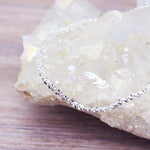 i+h Sterling Silver Bracelet sitting on a crystal - womens sterling silver jewellery Australia by australian jewellery brands indie and harper