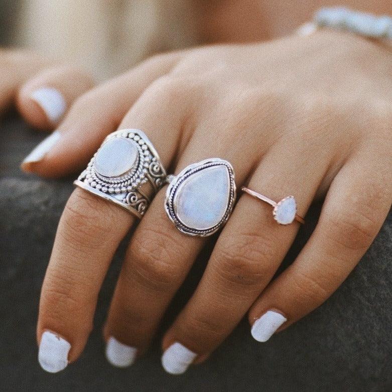 woman with white nails wearing Moonstone Rings - womens moonstone jewellery
