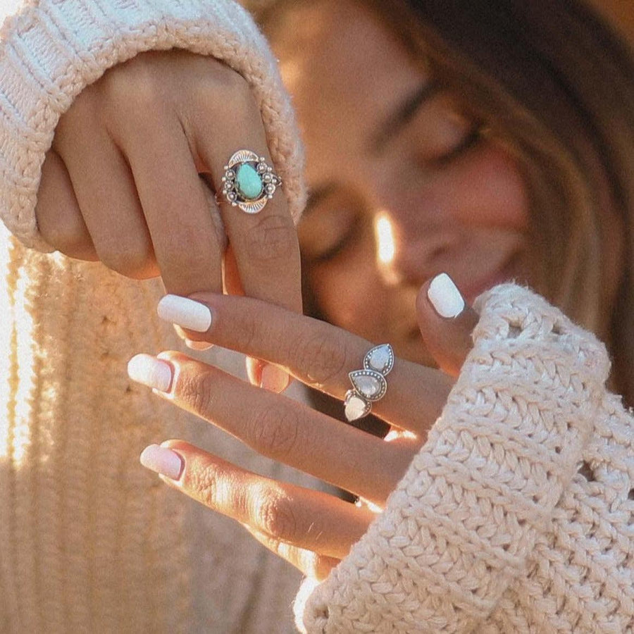 Woman wearing Sterling silver turquoise ring and Moonstone Ring - womens moonstone jewellery Australia 