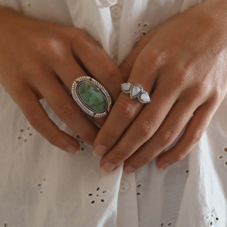 Woman wearing Sterling silver turquoise ring and Moonstone Ring - womens boho jewelry Australia 