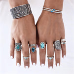 woman wearing sterling silver turquoise rings and turquoise bracelets by indie and harper