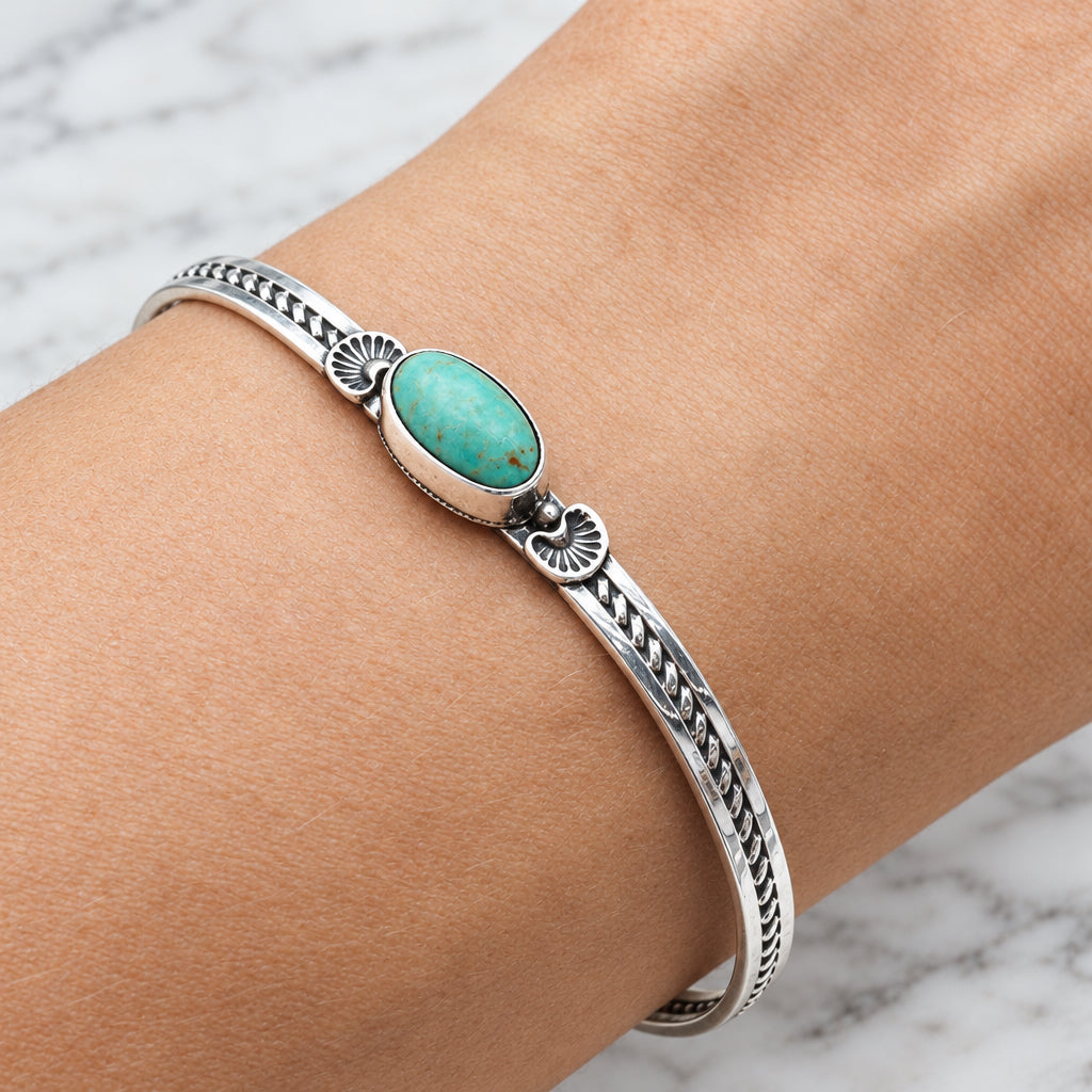 Navajo turquoise cuff bracelet worn on the wrist