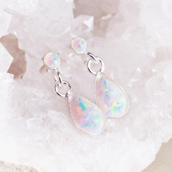 Opal Earrings sitting on a crystal - womens opal jewellery australia