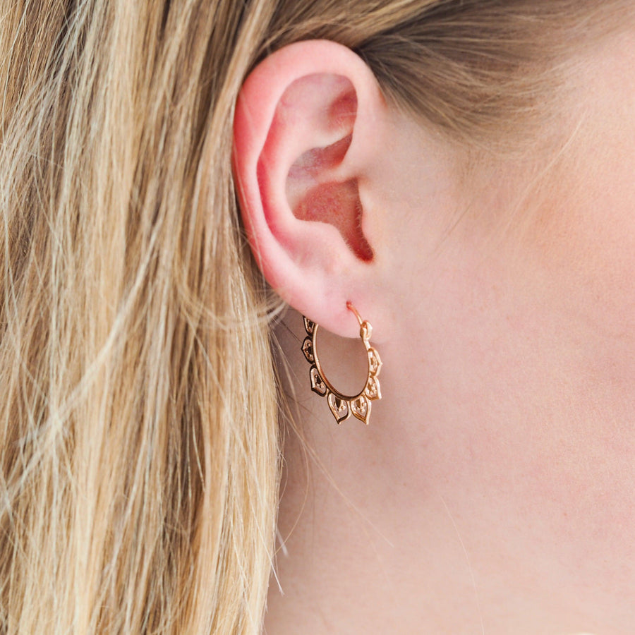 Woman wearing Rose Gold earrings - rose gold jewellery australia