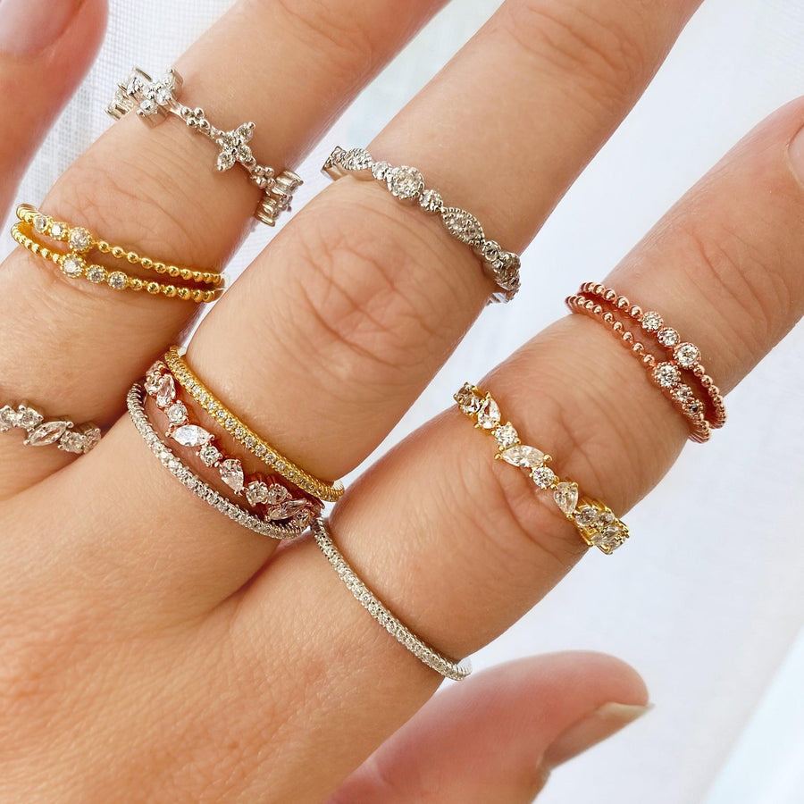 Hand wearing multiple dainty rings - womens jewellery Australia by indie and harper