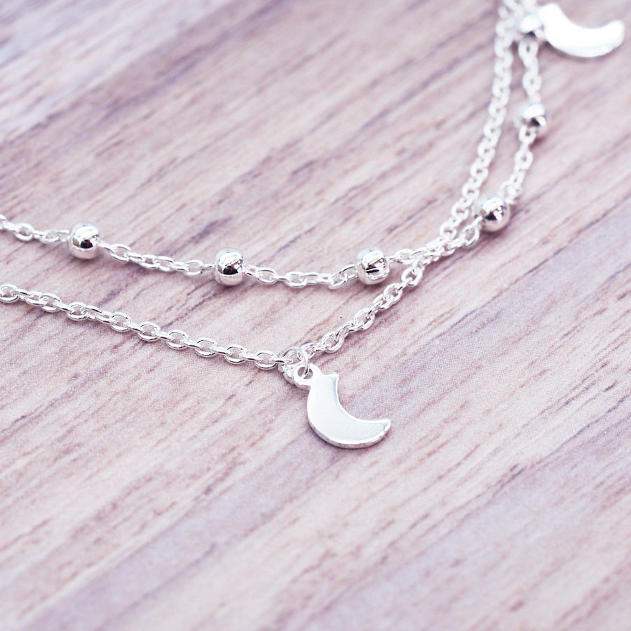 Close up of a Sterling Silver Anklet with dainty crescent moons - womens Sterling silver jewellery Australia