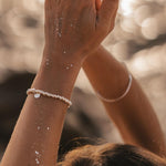 sterling silver Bracelets being worn by woman with hands in prayer position - designed by Australian jewellery brand Indie and Harper