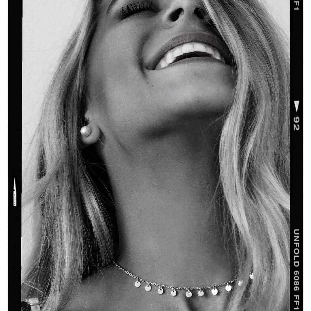 Smiling woman wearing Sterling Silver Necklace by indie and harper Australia 