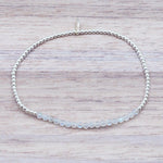 sterling Silver Beaded Moonstone Bracelet on a light wood surface