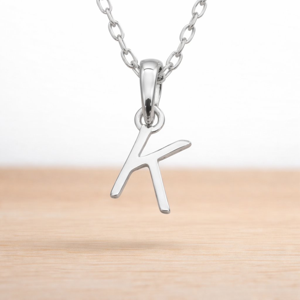 dainty sterling silver initial k necklace on a dainty chain