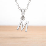 sterling silver initial m pendant on a sterling silver chain necklace