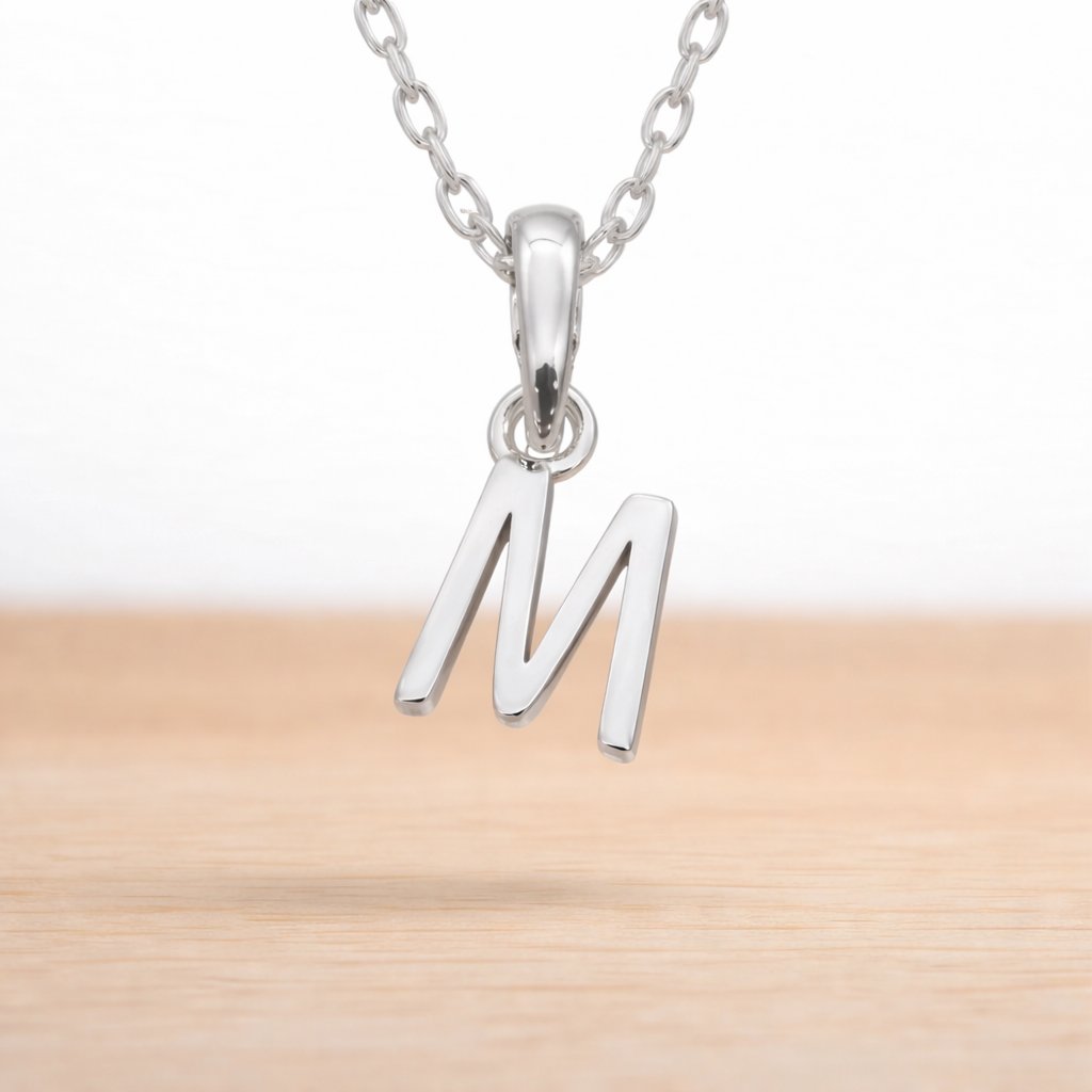 sterling silver initial m pendant on a sterling silver chain necklace