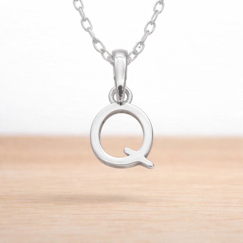sterling silver initial q pendant on a dainty sterling silver chain