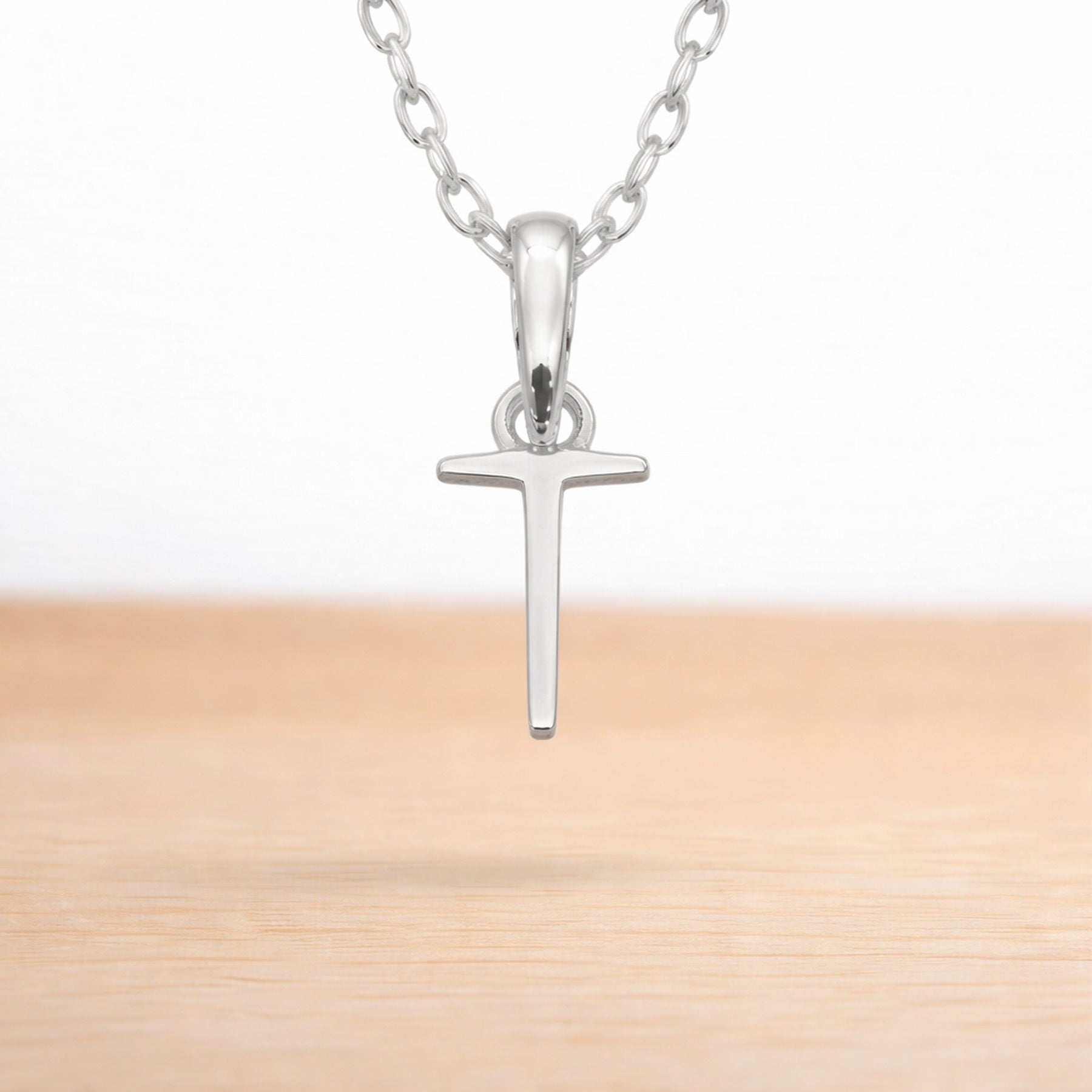 sterling silver initial t pendant on a dainty sterling silver chain