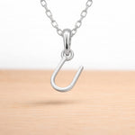 sterling silver initial u pendant on a dainty sterling silver chain 
