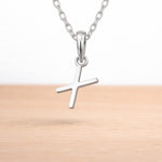 sterling silver initial x pendant on a sterling silver chain