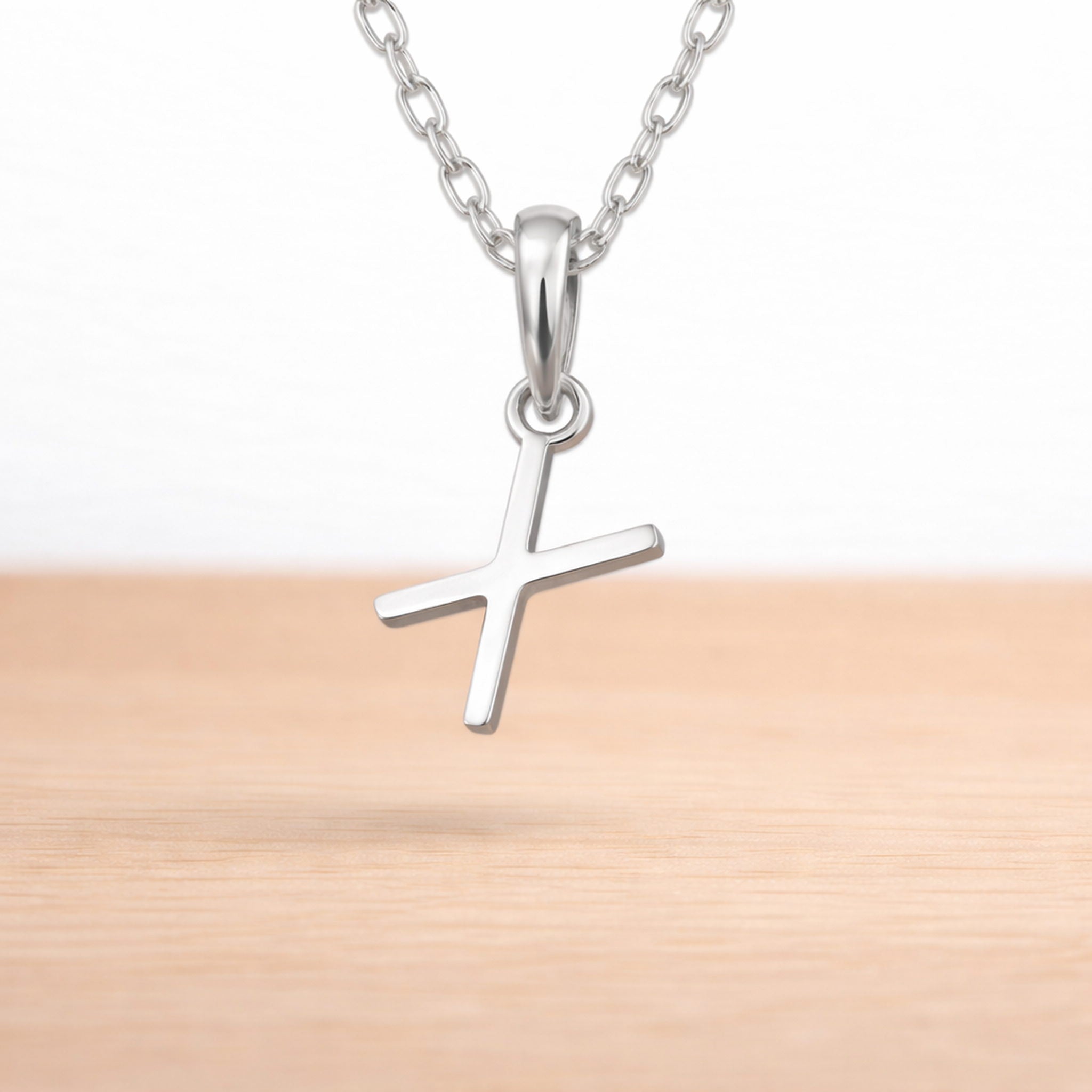 sterling silver initial x pendant on a sterling silver chain