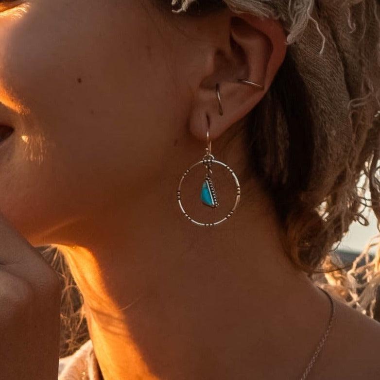 woman wearing Tribal Turquoise Earrings - turquoise jewellery by boho jewellery store indie and harper