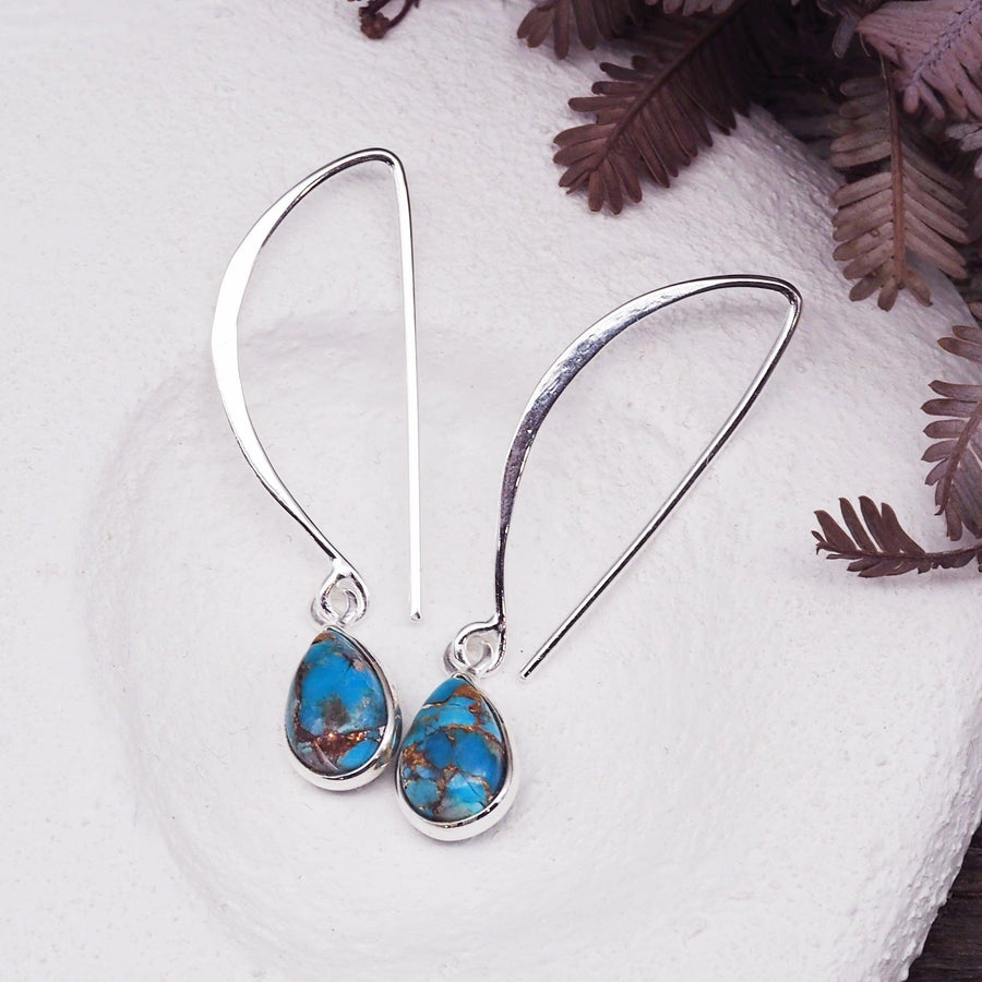 Turquoise Earrings sitting on a white dish - womens turquoise jewellery by indie and harper