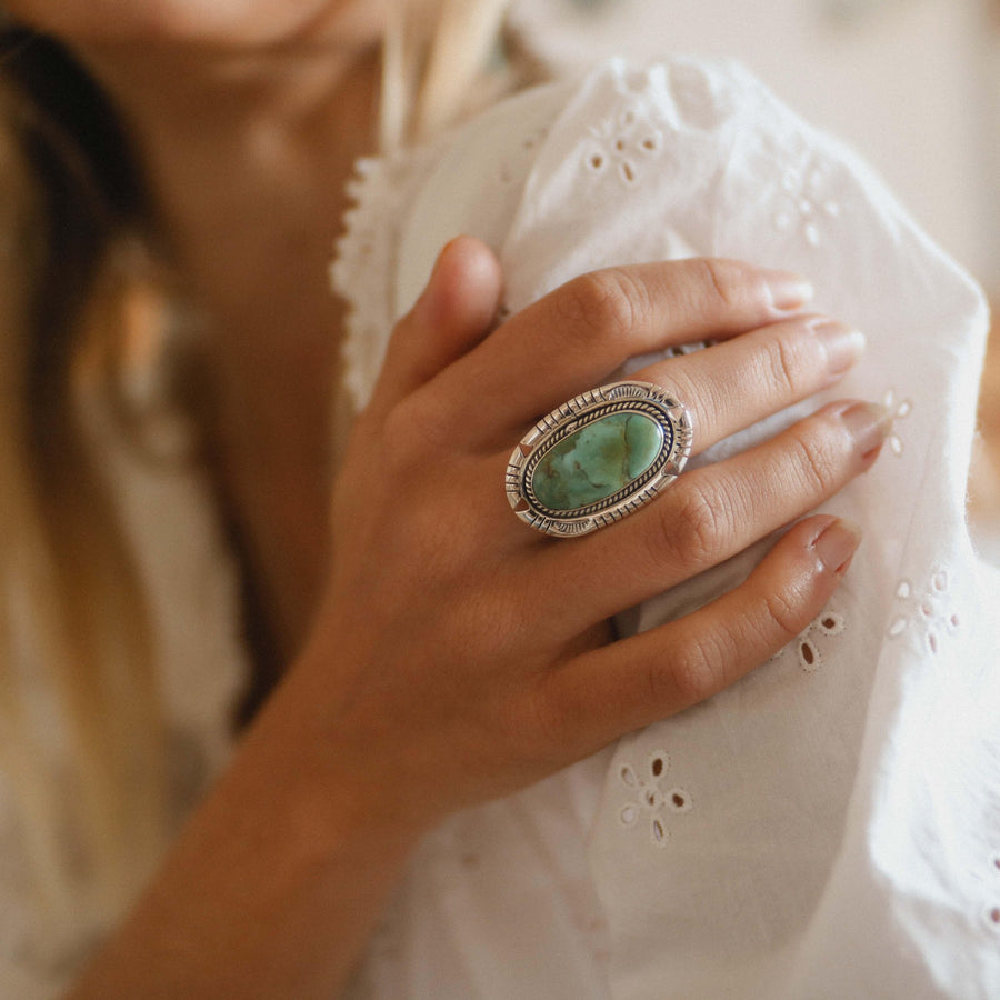 woman in white top wearing Turquoise Ring - womens turquoise jewellery by indie and harper