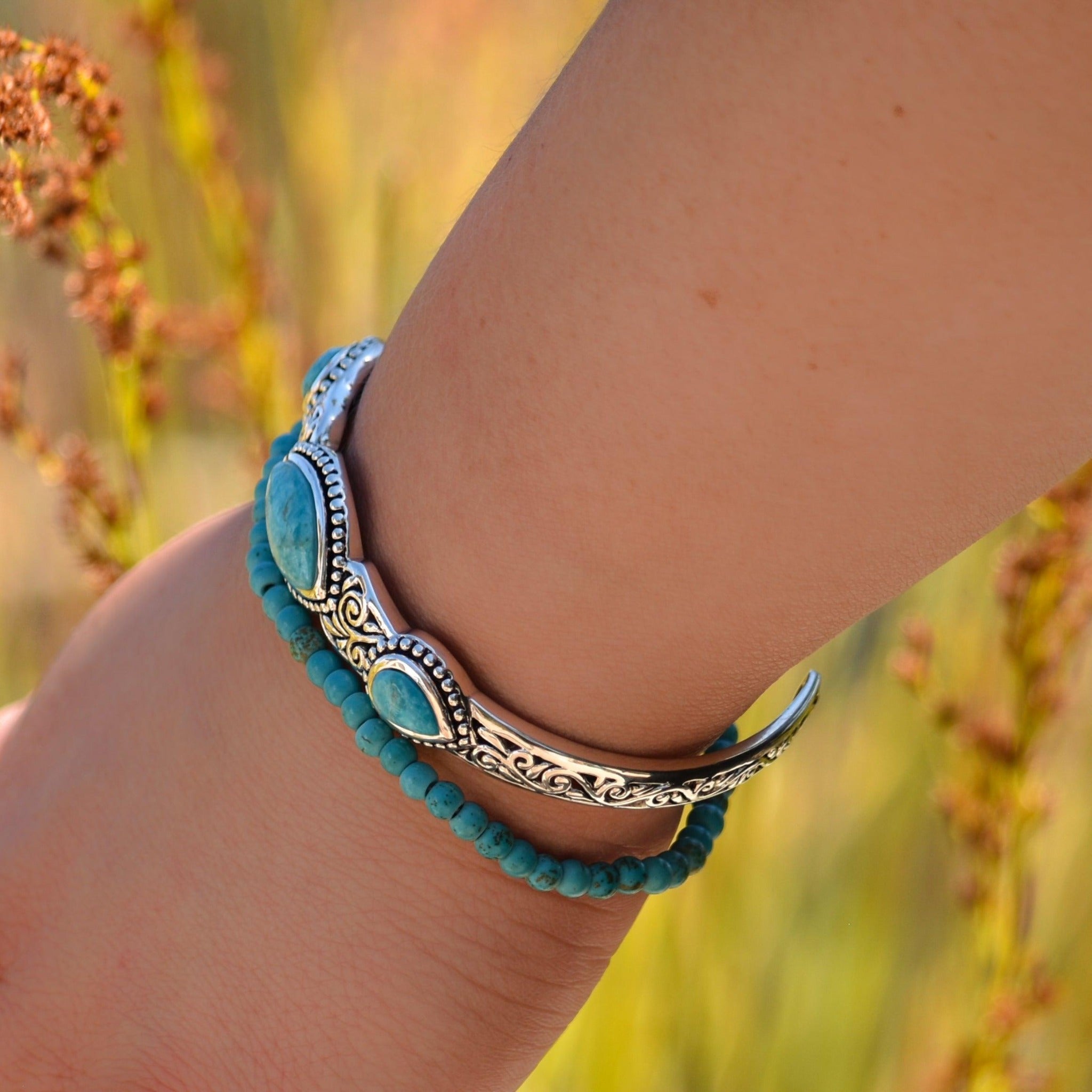 Woman wearing turquoise cuff and turquoise beaded Bracelet - boho jewelry by australian jewellery brands indie and Harper 