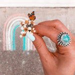 indie and harper Sterling silver rainbow Moonstone sun Ring being worn 